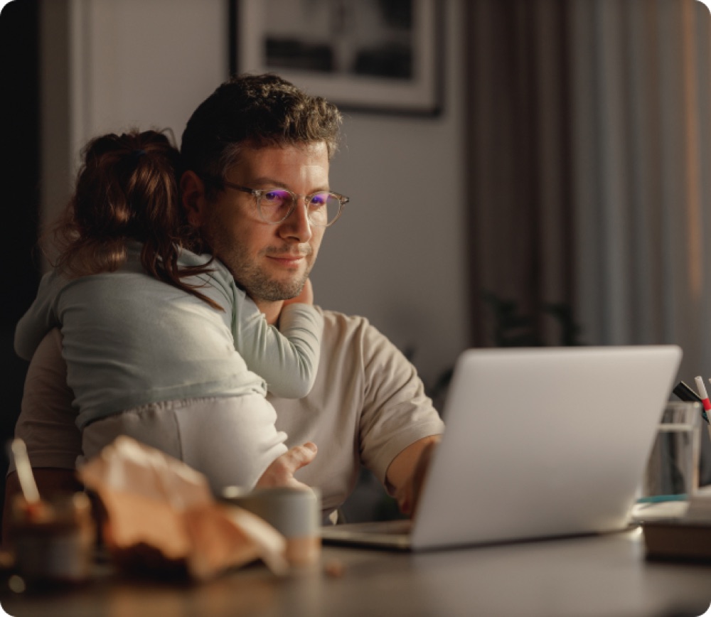 A couple using Provision Planner on a laptop at home